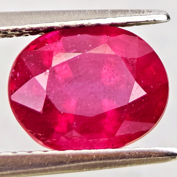 Natural Purplish Red Ruby Gemstones 2.58 Ct. Oval Shape 8.8 x 7 Mm.: Product ID: 805935626 Product Name: Natural Ruby Weight: 2.58 CT. Size: 8.8 x 7 x 5 MM. Shape: Oval Color: Purplish Red Clarity:VSI - SI1 Luster: Good Gems Origin: Madagascar Treatment: Heated (Lead-g