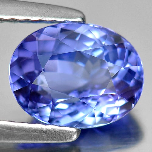 Natural Violet Tanzanite Gemstones 1.75 Ct. Clean Oval Shape 8.24 x 6.46 Mm.: Product ID: 807005465 Product Name: Natural Tanzanite Weight: 1.75 CT. Size: 8.24 x 6.46 x 4.54 MM. Shape: Oval Color: Violet Clarity:IF Luster: Very Good Gems Origin: Tanzania Treatment: Heated Cryst