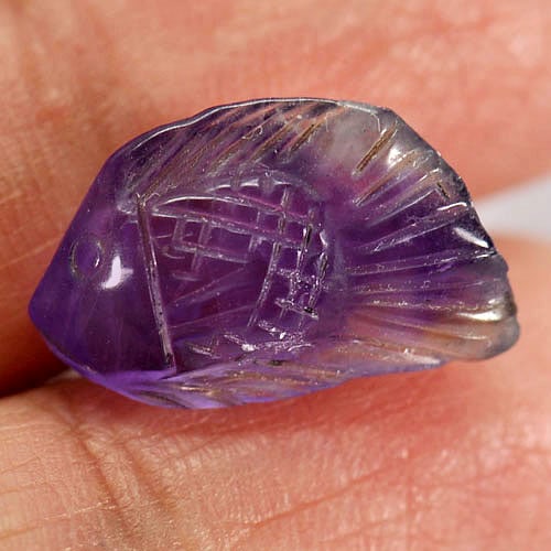 Natural Violet Amethyst Gemstones 7.08 Ct. Fish Carving Shape 17.8 x 10.9 Mm.: Product ID: 810303132 Product Name: Natural Amethyst Weight: 7.08 CT. Size: 17.8 x 10.9 x 7.1 MM. Shape: Fish Carving Color: Violet Clarity:Semi - Transparent Luster: Good Gems Origin: Brazil Treatmen