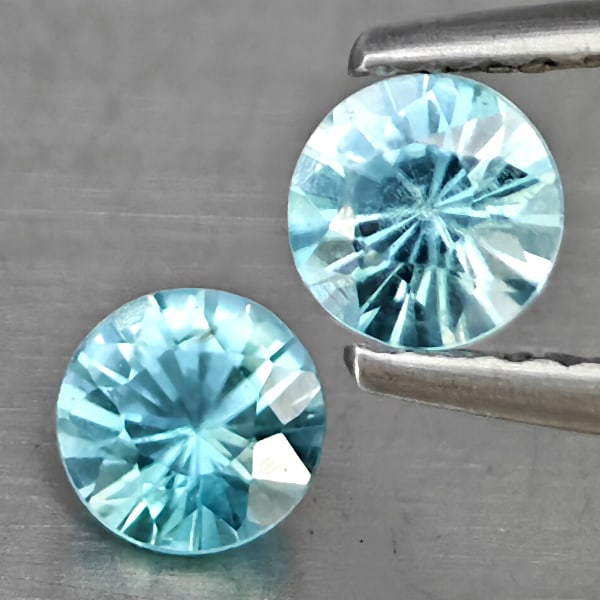 Natural Blue Zircon Gemstones 0.97 Ct. 2 Pcs. Round Diamond Cut 4.5 Mm.: Product ID: 807743261 Product Name: Natural Gemstones Weight: 0.97 CT. Size: 4.5 x 4.5 x 3 MM. Shape: Round Diamond Cut Color: Blue Clarity:SI1 Luster: Good Gems Origin: Cambodia Treatment: Heated Cry