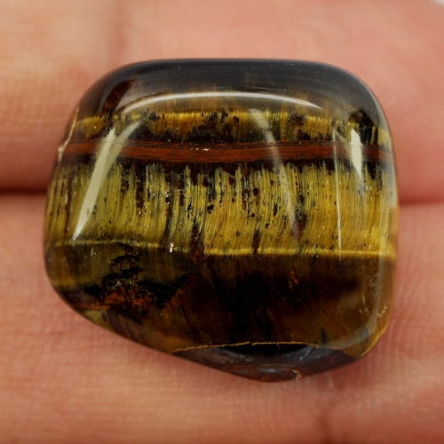 Natural Fancy Cabochon Yellow Brown Color Tiger Eye Agate 29.76 Ct.: Product ID: 860000632 Product Name: Natural Agate Weight: 29.76 CT. Size: 20.4 x 18.5 x 9.7 MM. Shape: Fancy Cabochon Color: Yellow Clarity:Opaque Luster: Good Gems Origin: Madagascar Treatment: Unhea