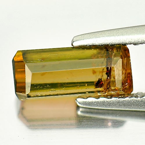 Natural Gem Greenish Brown Tourmaline 1.20 Ct. Octagon Shape 8.4 x 3.5 Mm.: Product ID: 807245614 Product Name: Natural Tourmaline Weight: 1.20 CT. Size: 8.4 x 3.5 x 3.6 MM. Shape: Octagon Color: Greenish Brown Clarity:SI1 Luster: Good Gems Origin: Nigeria Treatment: Unheated