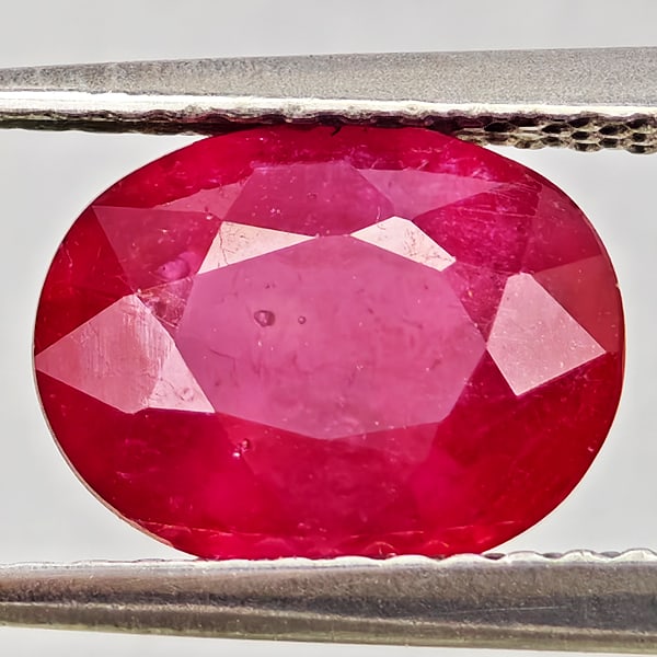 Natural Purplish Red Ruby Gemstones 2.32 Ct. Oval Shape 9 x 7 Mm.: Product ID: 805935634 Product Name: Natural Ruby Weight: 2.32 CT. Size: 9 x 7 x 4.1 MM. Shape: Oval Color: Purplish Red Clarity:VSI - SI1 Luster: Good Gems Origin: Madagascar Treatment: Heated (Lead-g