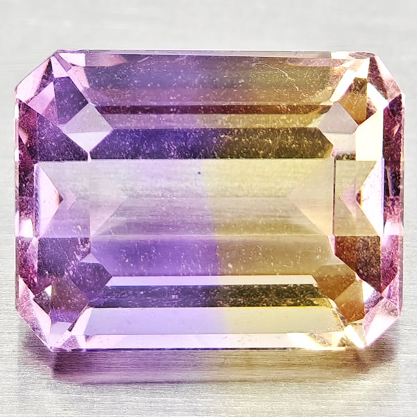 Natural Bi Color Ametrine Gemstones 2.65 Ct. Octagon Shape 9.2 x 7.1 Mm.: Product ID: 800408493 Product Name: Natural Ametrine Weight: 2.65 CT. Size: 9.2 x 7.1 x 5.4 MM. Shape: Octagon Color: Bi Color Clarity:VSI Luster: Good Gems Origin: Bolivia Treatment: Unheated Crystal