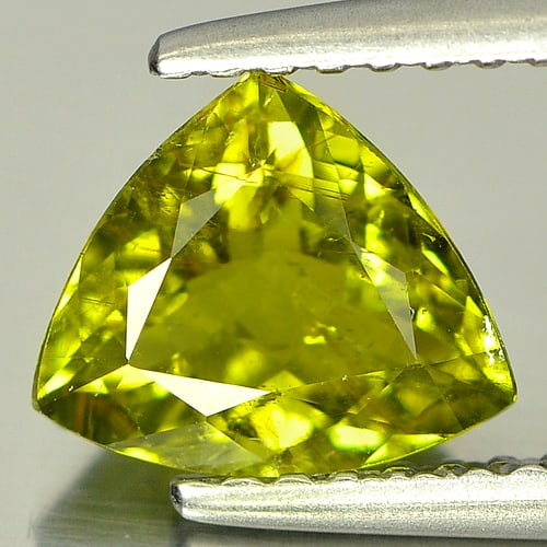 Natural Green Yellow Tourmaline Gemstones 1.07 Ct. Trilliant Shape 7.1 x 6.7 Mm.: Product ID: 807218095 Product Name: Natural Tourmaline Weight: 1.07 CT. Size: 7.1 x 6.7 x 3.8 MM. Shape: Trilliant Color: Green Yellow Clarity:SI Luster: Good Gems Origin: Nigeria Treatment: Unheated 
