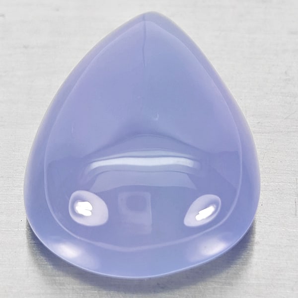 Natural Lavender Chalcedony Gemstones 37.02 Ct. Pear Cabochon Shape 27 x 19.6 Mm.: Product ID: 801502682 Product Name: Natural Chalcedony Weight: 37.02 CT. Size: 27 x 19.6 x 11 MM. Shape: Pear Cabochon Color: Lavender Clarity:Semi - Transparent Luster: Good Gems Origin: Russia Treat