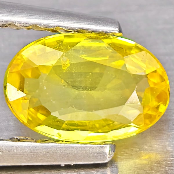 Natural Yellow Sapphire Gemstones 0.48 Ct. Oval Shape 6.1 x 4 Mm.: Product ID: 806162794 Product Name: Natural Yellow Sapphire Weight: 0.48 CT. Size: 6.1 x 4 x 1.9 MM. Shape: Oval Shape Color: Yellow Clarity:VSI Luster: Good Gems Origin: Thailand Treatment: Heated Cr