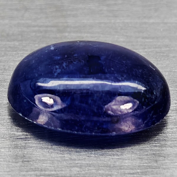 Natural Blue Sapphire Gemstones 3.39 Ct. Oval Cabochon Shape 10 x 7.4 Mm.: Product ID: 806012344 Product Name: Natural Blue Sapphire Weight: 3.39 CT. Size: 10 x 7.4 x 4.4 MM. Shape: Oval Cabochon Color: Blue Clarity:Semi - Transparent Luster: Good Gems Origin: Madagascar Tre