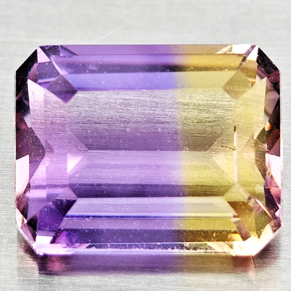 Natural Bi Color Ametrine Gemstones 2.46 Ct. Octagon Shape 9.2 x 7.2 Mm.: Product ID: 800408516 Product Name: Natural Ametrine Weight: 2.46 CT. Size: 9.2 x 7.2 x 4.7 MM. Shape: Octagon Color: Bi Color Clarity:VSI Luster: Good Gems Origin: Bolivia Treatment: Unheated Crystal