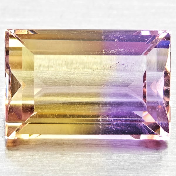 Natural Bi Color Ametrine Gemstones 3.39 Ct. Baguette Shape 10.8 x 7.2 Mm.: Product ID: 800408480 Product Name: Natural Ametrine Weight: 3.39 CT. Size: 10.8 x 7.2 x 5.4 MM. Shape: Baguette Color: Bi Color Clarity:VSI Luster: Good Gems Origin: Bolivia Treatment: Unheated Cryst