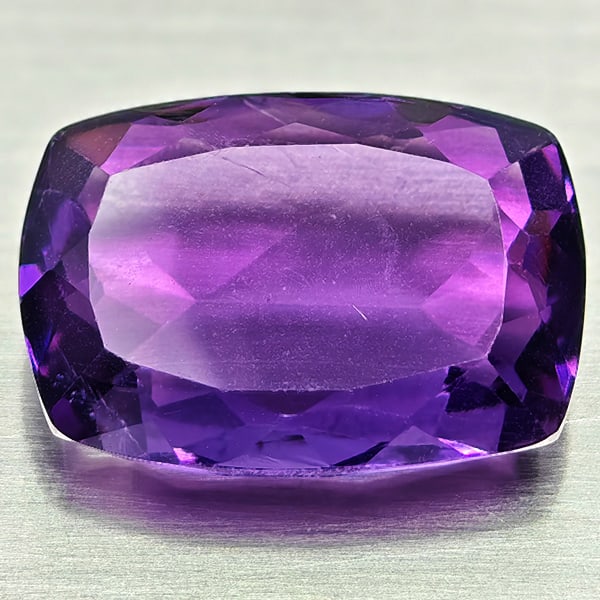 Natural Purple Amethyst Gemstones 7.75 Ct. Cushion Shape 15.4 x 10.8 Mm.: Product ID: 800325455 Product Name: Natural Amethyst Weight: 7.75 CT. Size: 15.4 x 10.8 x 15.8 MM. Shape: Cushion Shape Color: Purple Clarity:VSI Luster: Good Gems Origin: Brazil Treatment: Unheated C