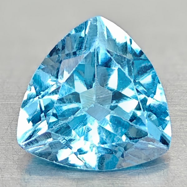 Natural Swiss Blue Topaz Gemstones 2.98 Ct. Trilliant Shape 9 Mm.: Product ID: 807167879 Product Name: Natural Blue Topaz Weight: 2.98 CT. Size: 9 x 9 x 5.6 MM. Shape: Trilliant Color: Swiss Blue Clarity:VSI Luster: Good Gems Origin: Brazil Treatment: Treated Crystal