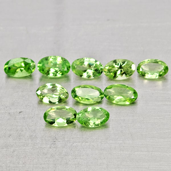 Natural Green Tsavorite Garnet Gemstones 2.42 Ct. 10 Pcs. Oval Shape Mixed Size: Product ID: 803005089 Product Name: Natural Tsavorite Weight: 2.42 CT. Size: 5.1 x 3.2 x 2.6 to 4.9 x 3 x 1.7 MM. Shape: Oval Shape Color: Green Clarity:SI Luster: Good Gems Origin: Tanzania Treatment