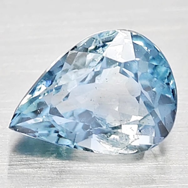 Natural Light Blue Aquamarine Gemstones 1.35 Ct. Pear Shape 8.3 x 6.3 Mm.: Product ID: 800812052 Product Name: Natural Aquamarine Weight: 1.35 CT. Size: 8.3 x 6.3 x 4.8 MM. Shape: Pear Shape Color: Light Blue Clarity:VSI - SI1 Luster: Good Gems Origin: Brazil Treatment: Unhe