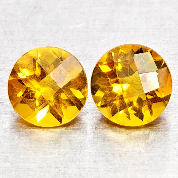 Natural Yellow Citrine Gemstones 1.44 Ct. 2 Pcs. Round Checkerboard Cut 6 Mm.: Product ID: 801815171 Product Name: Natural Citrine Weight: 1.44 CT. Size: 6 x 6 x 4.2 MM. Shape: Round Checkerboard Cut Color: Yellow Clarity:VSI - SI1 Luster: Good Gems Origin: Brazil Treatment: Unh