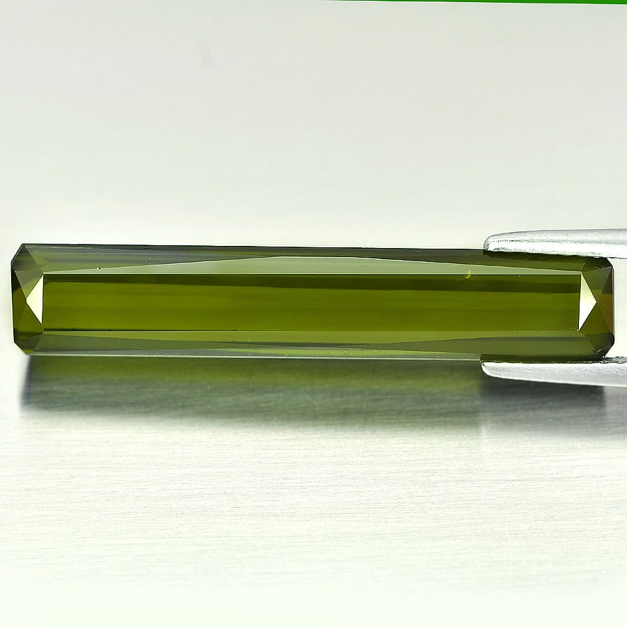 Natural Green Tourmaline Gemstones 10.96 Ct. Octagon Shape 32 x 6 Mm.: Product ID: 807233557 Product Name: Natural Tourmaline Weight: 10.96 CT. Size: 32 x 6 x 5.2 MM. Shape: Octagon Color: Green Clarity:VSI Luster: Good Gems Origin: Nigeria Treatment: Unheated Crystal St
