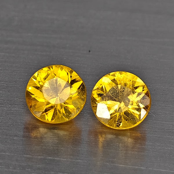 Natural Yellow Songea Sapphire Gemstones 0.44 Ct. 2 Pcs. Round Diamond Cut 3.5 Mm.: Product ID: 806130502 Product Name: Natural Blue Sapphire Weight: 0.44 CT. Size: 3.5 x 3.5 x 2.5 MM. Shape: Round Diamond Cut Color: Yellow Clarity:SI1 Luster: Good Gems Origin: Tanzania Treatment: He