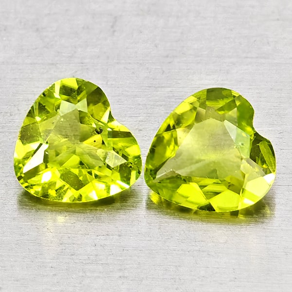 Natural Green Peridot Gemstones 1.42 Ct. 2 Pcs. Heart Shape 6.3 x 6 Mm.: Product ID: 805317338 Product Name: Natural Peridot Weight: 1.42 CT. Size: 6.3 x 6 x 2.8 MM. Shape: Heart Shape Color: Green Clarity:VSI - SI1 Luster: Good Gems Origin: Pakistan Treatment: Unheated Cr
