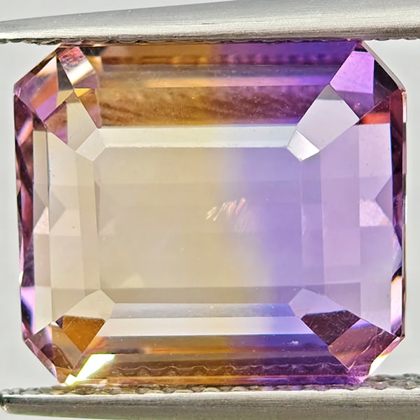 Natural Bi Color Ametrine Gemstones 7.13 Ct. Octagon Shape 11.8 x 10.4 Mm.: Product ID: 800408642 Product Name: Natural Ametrine Weight: 7.13 CT. Size: 11.8 x 10.4 x 7 MM. Shape: Octagon Color: Bi Color Clarity:VVS Luster: Good Gems Origin: Bolivia Treatment: Unheated Crystal