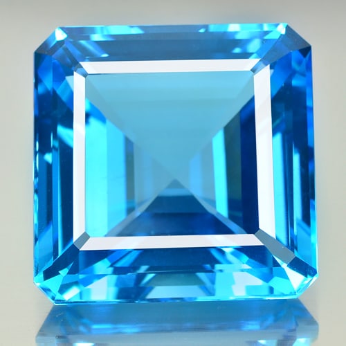 Natural Swiss Blue Topaz Gemstones 228.97 Ct. Clean Octagon Shape 34 x 34 Mm.: Product ID: 807156482 Product Name: Natural Blue Topaz Weight: 228.97 CT. Size: 34 x 34 x 21 MM. Shape: Octagon Color: Swiss Blue Clarity:IF Luster: Very Good Gems Origin: Brazil Treatment: Treated Cr