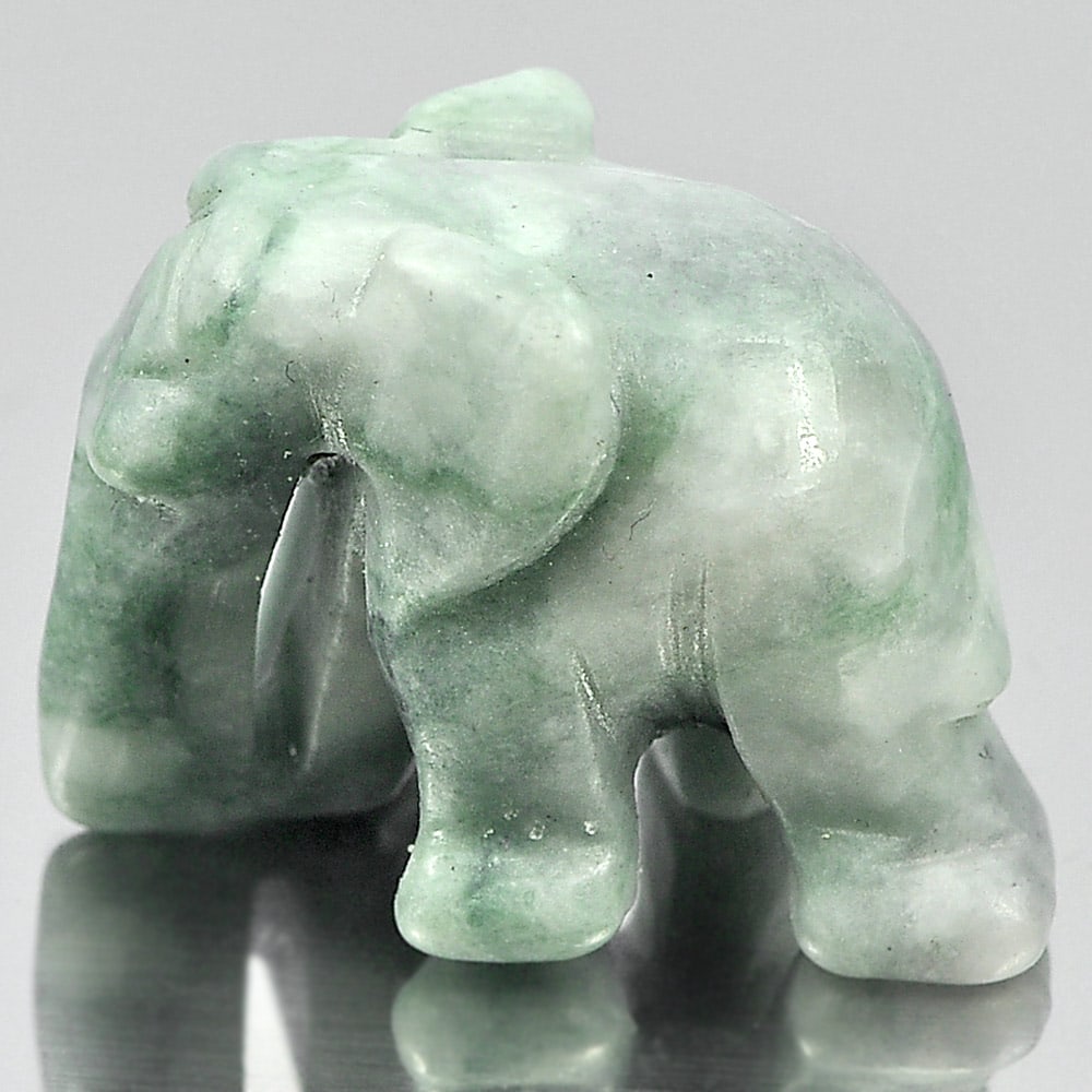 Natural Green White Jade Gemstones 44.75 Ct. Elephant Carving 24 x 18 Mm.: Product ID: 819813039 Product Name: Natural Jade Weight: 44.75 CT. Size: 24 x 18 x 15 MM. Shape: Elephant Carving Color: Green Clarity:Opaque Luster: Good Gems Origin: Thailand Treatment: Unheated Cry