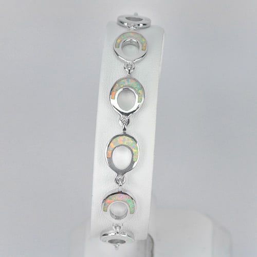 925 Sterling Silver Jewelry 12.82 Grams Multi Color White Created Opal Bracelet 7.5 Inch.: Product ID: 280160022 Product Type: 925 Sterling Silver Fine Jewelry Jewelry Weight: 12.82 Grams. Gemstones Color: Multi-Color Metal: Solid Silver 92.5%. Gemstone Detail: Average Range 12.61 - 13.10 G