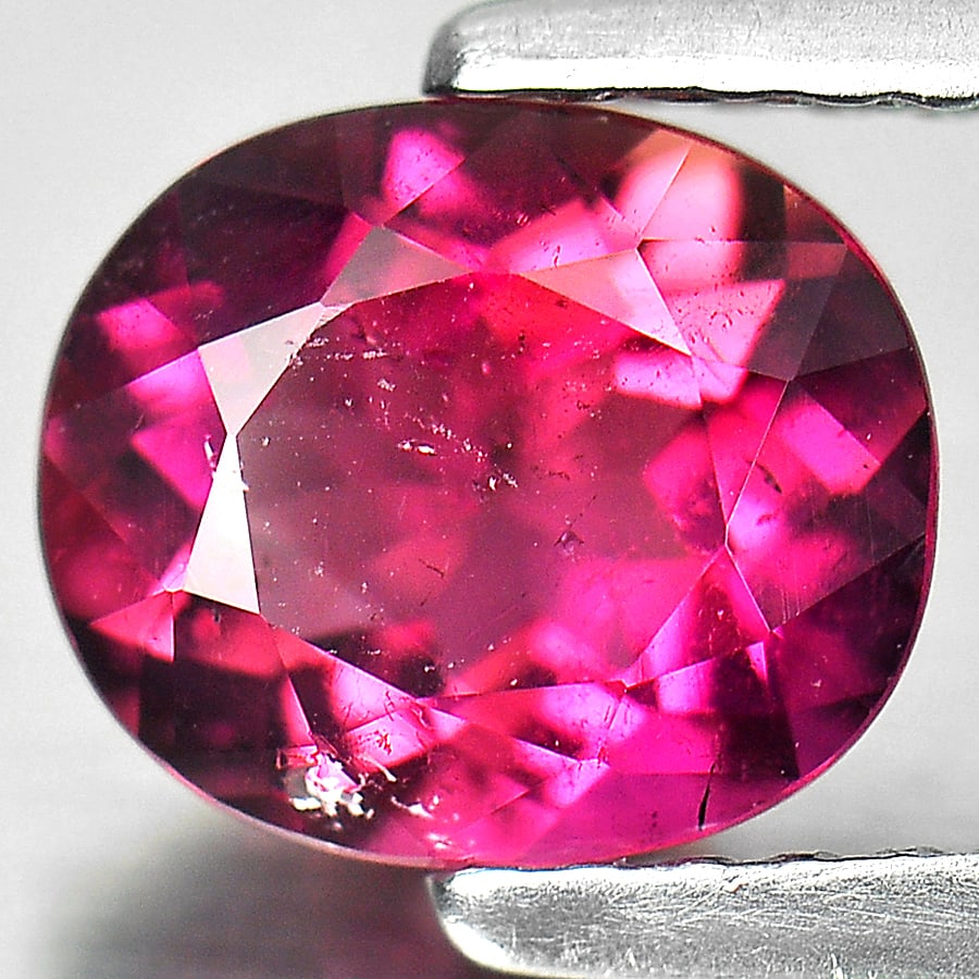 Natural Purplish Pink Tourmaline Gemstones 1.20 Ct. Oval Shape 7.4 x 6.3 Mm.: Product ID: 807238667 Product Name: Natural Tourmaline Weight: 1.20 CT. Size: 7.4 x 6.3 x 4 MM. Shape: Oval Color: Purplish Pink Clarity:SI1 Luster: Very Good Gems Origin: Nigeria Treatment: Unheated 
