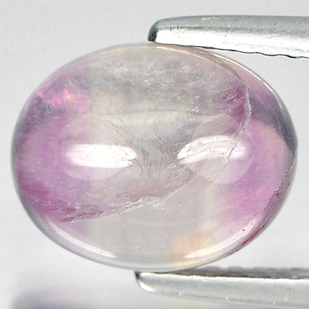 Natural Multi-Color Fluorite Gemstones 3.77 Ct. Oval Cabochon Shape 10 x 8.1 Mm.: Product ID: 802706064 Product Name: Natural Fluorite Weight: 3.77 CT. Size: 10 x 8.1 x 4.6 MM. Shape: Oval Cabochon Color: Multi-Color Clarity:Semi - Transparent Luster: Good Gems Origin: Brazil Treat