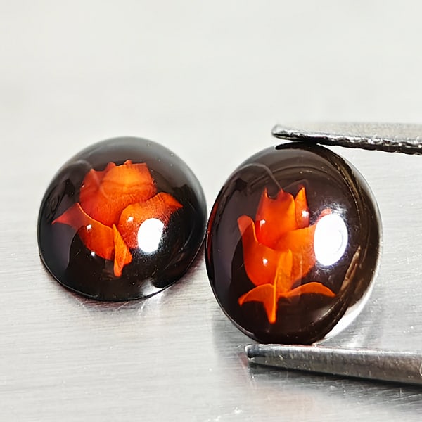 Natural Brown Yellow Amber Gemstones 1.10 Ct. 2 Pcs. Flower Carving In Shape 8.8 x 7.4 Mm.: Product ID: 819090996 Product Name: Natural Amber Weight: 1.10 CT. Size: 8.8 x 7.4 x 2.9 MM. Shape: Oval Cabochon Color: Brown Yellow Clarity:Semi - Transparent Luster: Good Gems Origin: Poland Treatm