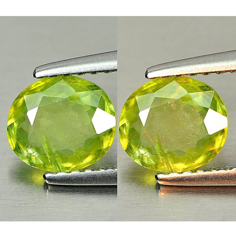 Natural Green Titanium Sphene Gemstones With Rainbow Spark 0.86 Ct. Oval Shape 6.8 x 6 Mm.: Product ID: 806507915 Product Name: Natural Sphene Weight: 0.86 CT. Size: 6.8 x 6 x 2.4 MM. Shape: Oval Color: Green Clarity:SI1 Luster: Adamantine Gems Origin: Madagascar Treatment: Unheated Crystal 