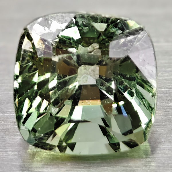 Natural Green Sapphire Gemstones 0.82 Ct. Cushion Shape 4.7 x 4.7 Mm.: Product ID: 106111465 Product Name: Natural Green Sapphire Weight: 0.82 CT. Size: 4.7 x 4.7 x 4 MM. Shape: Cushion Color: Green Clarity:IF Luster: Good Gems Origin: Thailand Treatment: Warm Crystal St