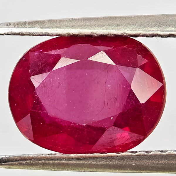 Natural Purplish Red Ruby Gemstones 2.66 Ct. Oval Shape 9.1 x 7.1 Mm.: Product ID: 805935618 Product Name: Natural Ruby Weight: 2.66 CT. Size: 9.1 x 7.1 x 4.4 MM. Shape: Oval Color: Purplish Red Clarity:VSI Luster: Good Gems Origin: Madagascar Treatment: Heated (Lead-gla