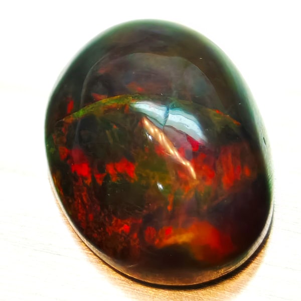 Natural Multi-Color Play Of Colour Opal Gemstones 1.45 Ct. Oval Cabochon Shape (1 of 3)