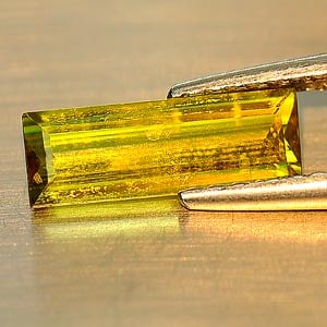 Natural Multi Color Titanium Sphene With Rainbow Spark 0.97 Ct. Baguette Shape: Product ID: 806507088 Product Name: Natural Sphene Weight: 0.97 CT. Size: 10.3 x 3.7 x 2.3 MM. Shape: Baguette Color: Multi Color With Rainbow Spark Clarity:SI Luster: Adamantine Gems Origin: Madagasc