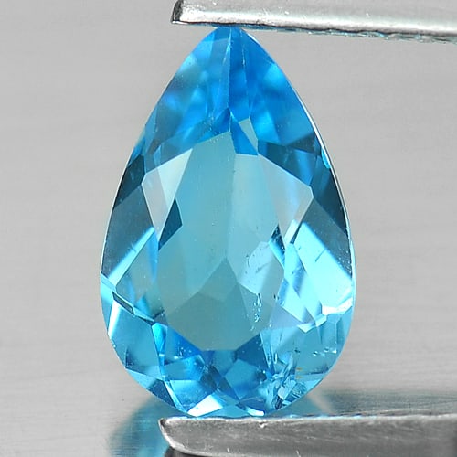 Natural Swiss Blue Topaz Gemstones 1.38 Ct. Pear Shape 9.3 x 6 Mm.: Product ID: 807149653 Product Name: Natural Blue Topaz Weight: 1.38 CT. Size: 9.3 x 6 x 3.4 MM. Shape: Pear Color: Swiss Blue Clarity:SI Luster: Good Gems Origin: Brazil Treatment: Treated Crystal Str