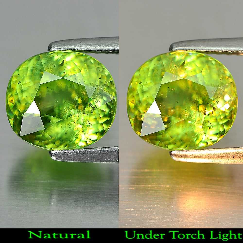 Natural Green Sphene With Rainbow Spark 3.50 Ct. Oval Shape 9.4 x 8.5 Mm.: Product ID: 806507749 Product Name: Natural Sphene Weight: 3.50 CT. Size: 9.4 x 8.5 x 5.7 MM. Shape: Oval Color: Green With Rainbow Spark Clarity:VSI Luster: Adamantine Gems Origin: Madagascar Treatme