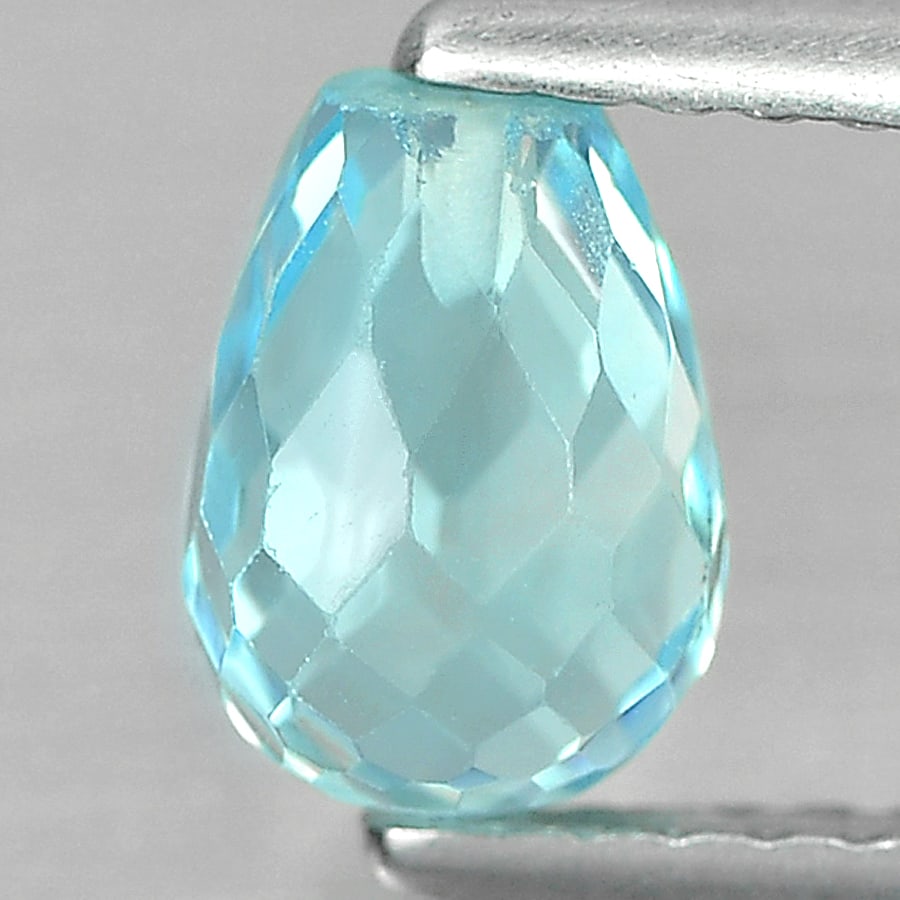 Natural Blue Topaz Gemstones 1.64 Ct. Briolette with Drilled 7 Mm.: Product ID: 807167525 Product Name: Natural Blue Topaz Weight: 1.64 CT. Size: 7 x 5 MM. Shape: Briolette with Drilled Color: Blue Clarity:VSI Luster: Good Gems Origin: Brazil Treatment: Treated Crysta