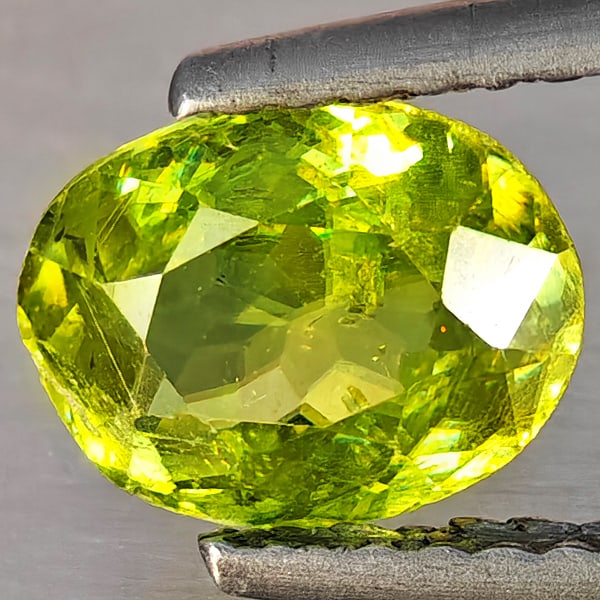 Natural Multi-Color With Rainbow Spark Sphene Gemstones 1.20 Ct. Oval Shape 7.8 x 5.9 Mm.: Product ID: 806509233 Product Name: Natural Sphene Weight: 1.20 CT. Size: 7.8 x 5.9 x 3.6 MM. Shape: Oval Shape Color: Multi-Color Clarity:SI1 Luster: Good Gems Origin: Madagascar Treatment: Unheated 