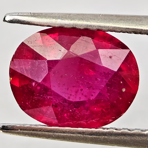 Natural Purplish Red Ruby Gemstones 2.14 Ct. Oval Shape 9 x 7.1 Mm.: Product ID: 805935650 Product Name: Natural Ruby Weight: 2.14 CT. Size: 9 x 7.1 x 4 MM. Shape: Oval Color: Purplish Red Clarity:VSI - SI1 Luster: Good Gems Origin: Madagascar Treatment: Heated (Lead-g