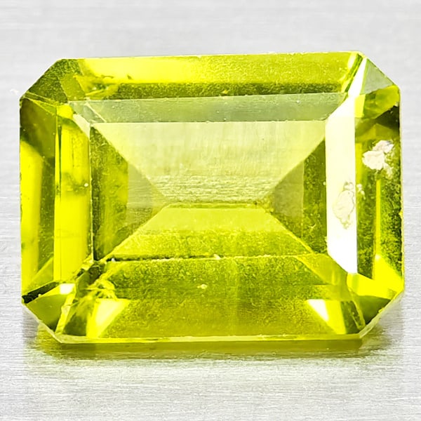 Natural Green Peridot Gemstones 1.49 Ct. Octagon Shape 8.1 x 6 Mm.: Product ID: 805317161 Product Name: Natural Peridot Weight: 1.49 CT. Size: 8.1 x 6 x 3.6 MM. Shape: Octagon Color: Green Clarity:SI1 Luster: Good Gems Origin: Pakistan Treatment: Unheated Crystal Stru