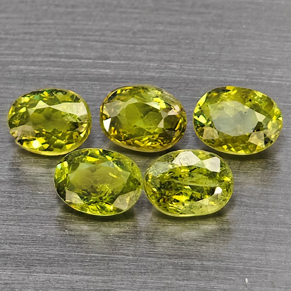Natural Green Demantiod Garnet Gemstones 1.22 Ct. 5 Pcs. Oval Shape 4 x 3 Mm.: Product ID: 802937616 Product Name: Natural Demantoid Weight: 1.22 CT. Size: 4 x 3 x 2 MM. Shape: Oval Shape Color: Green Clarity:SI1 Luster: Good Gems Origin: Madagascar Treatment: Unheated Crystal S