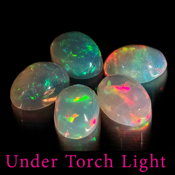 Natural Multi Color Opal Gemstones 1.65 Ct. 5 Pcs. Oval Cabochon Shape 6.1 x 4.2 Mm.: Product ID: 818728090 Product Name: Natural Opal Weight: 1.65 CT. Size: 6.1 x 4.2 x 2.9 MM. Shape: Oval Cabochon Color: Multi-Color Clarity:Semi - Transparent Luster: Good Gems Origin: Ethiopia Treatm