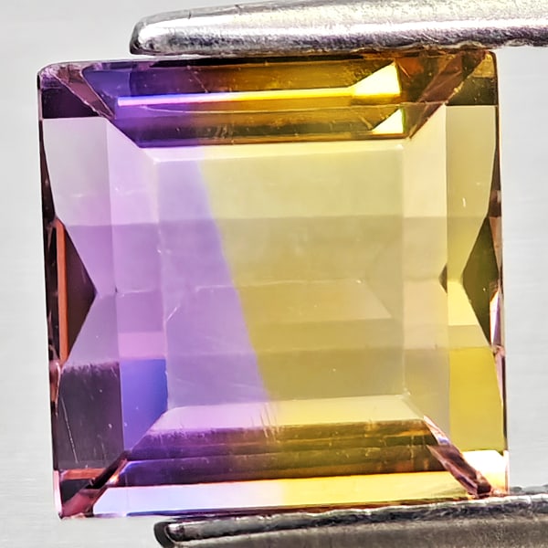 Natural Bi Color Ametrine Gemstones 2.74 Ct. Baguette Shape 8 x 7.9 Mm.: Product ID: 800408272 Product Name: Natural Ametrine Weight: 2.74 CT. Size: 8 x 7.9 x 5.4 MM. Shape: Baguette Color: Bi Color Clarity:VSI Luster: Good Gems Origin: Bolivia Treatment: Unheated Crystal 