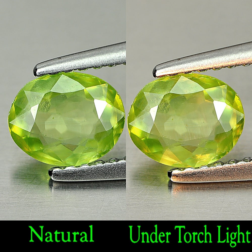 Natural Green Titanium Sphene Gemstones With Rainbow Spark 0.69 Ct. Oval Shape 6.8 x 5.5 Mm.: Product ID: 806507919 Product Name: Natural Sphene Weight: 0.69 CT. Size: 6.8 x 5.5 x 2.2 MM. Shape: Oval Color: Green With Rainbow Spark Clarity:SI1 Luster: Adamantine Gems Origin: Madagascar Treatme