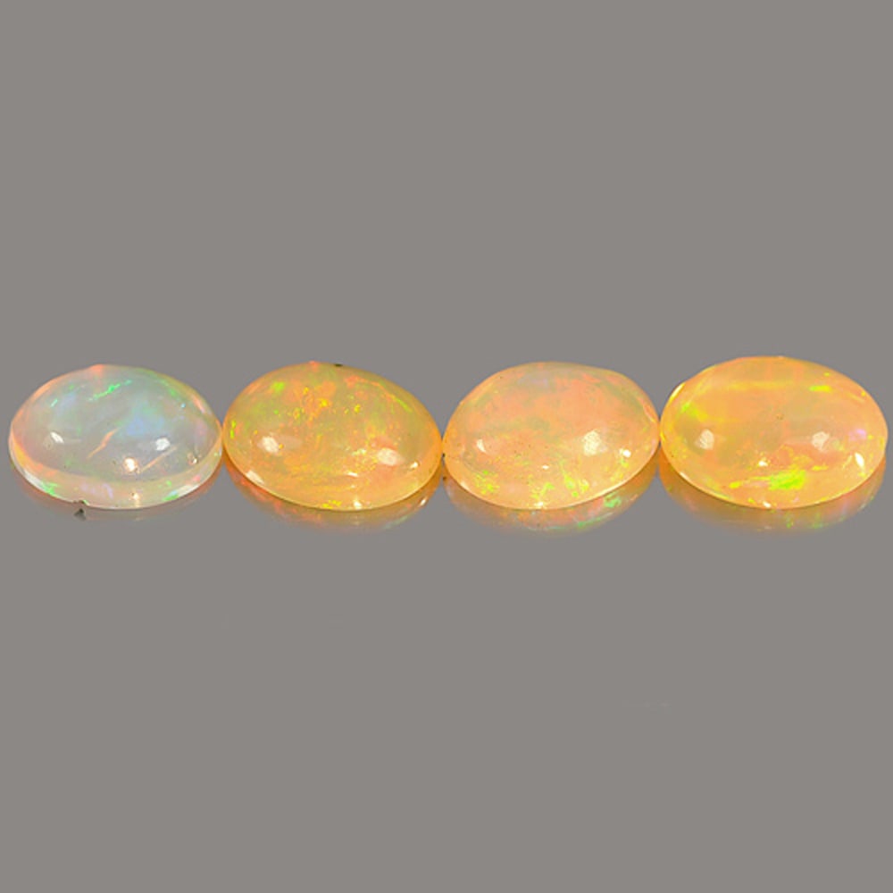 Natural Multi Color Opal Gemstones 2.77 Ct. 4 Pcs. Oval Cabochon Shape 7.8 x 5.9 Mm.: Product ID: 818726099 Product Name: Natural Opal Weight: 2.77 CT. Size: 7.8 x 5.9 x 2.9 MM. Shape: Oval Cabochon Color: Multi-Color Clarity:Semi - Transparent Luster: Iridescent Gems Origin: Ethiopia 