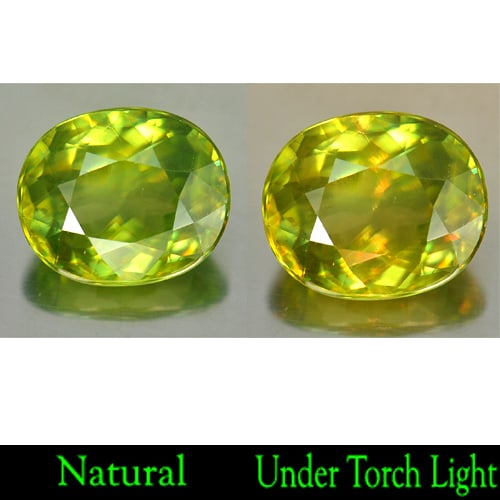 Natural Yellowish Green Titanium Sphene With Rainbow Spark Oval Shape 2.43 Ct.: Product ID: 806505371 Product Name: Natural Sphene Weight: 2.43 CT. Size: 9 x 7.5 x 4.4 MM. Shape: Oval Color: Yellowish Green Titanium With Rainbow Clarity:VSI Luster: Adamantine Gems Origin: Madagas