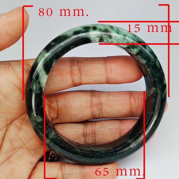 Natural Genuine Mulit Color Jade Gemstones 448.29 Ct. Bangle Round Shape 80 x 65 Mm.: Product ID: 819816091 Product Name: Natural Gemstones Weight: 448.29 CT. Size: 80 x 65 x 15 MM. Shape: Round Shape Color: Multi-Color Green Clarity:Opaque Luster: Good Gems Origin: Thailand Treatment: