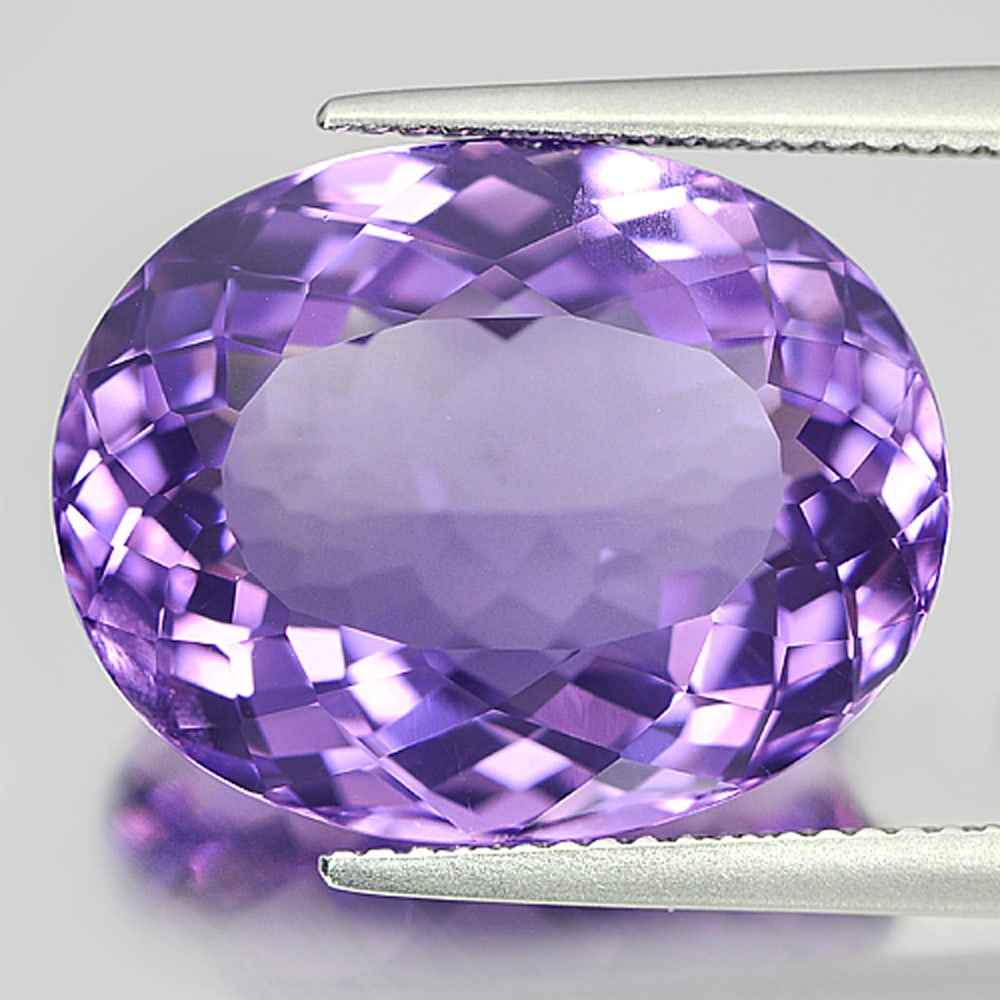 Natural Purple Amethyst Gemstones 16.44 Ct. Oval Shape 18.9 x 14.9 Mm.: Product ID: 800320599 Product Name: Natural Amethyst Weight: 16.44 CT. Size: 18.9 x 14.9 x 9.5 MM. Shape: Oval Color: Purple Clarity:VVS Luster: Very Good Gems Origin: Brazil Treatment: Unheated Cryst