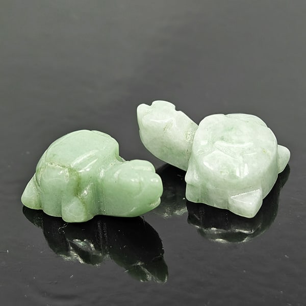 Natural Genuine Multi Color Jade 48.61 Ct. 2 Pcs Turtle Carving Shape: Product ID: 819815936 Product Name: Natural Gemstones Weight: 48.61 CT. Size: 14 x 22 x 10 MM. Shape: Turtle Carving Shape Color: Multi Color Clarity:Opaque Luster: Good Gems Origin: Thailand Treatmen