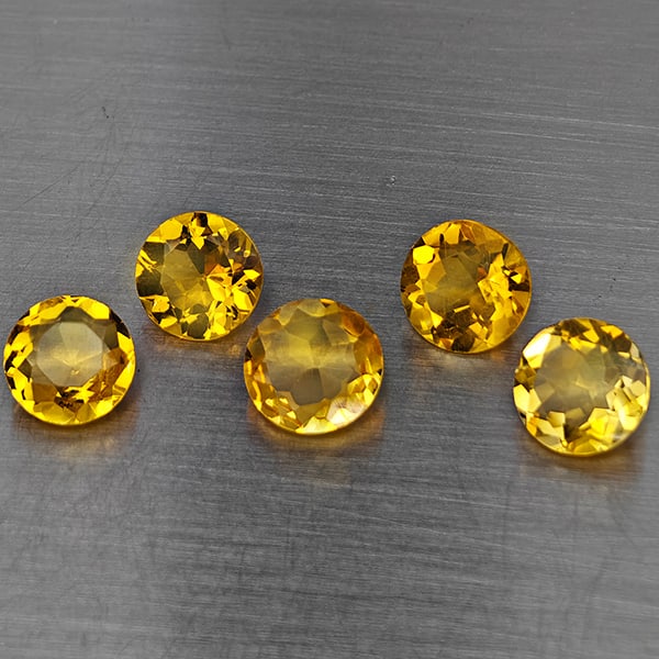 Natural Yellow Citrine Gemstones 5.63 Ct. 5 Pcs. Round Shape 7 Mm.: Product ID: 801815505 Product Name: Natural Citrine Weight: 5.63 CT. Size: 7 x 7 x 3.5 MM. Shape: Round Color: Yellow Clarity:SI1 Luster: Good Gems Origin: Brazil Treatment: Unheated Crystal Structure
